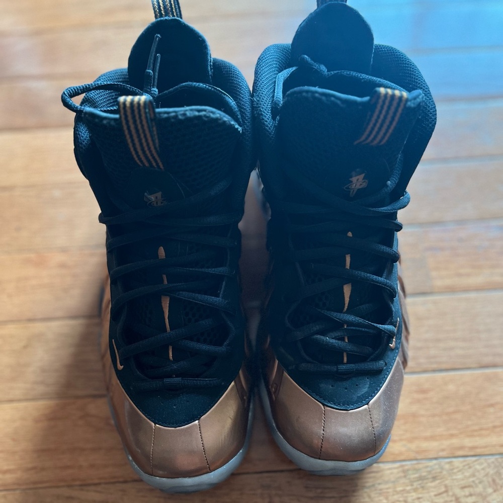 Bronze Nike foam posits